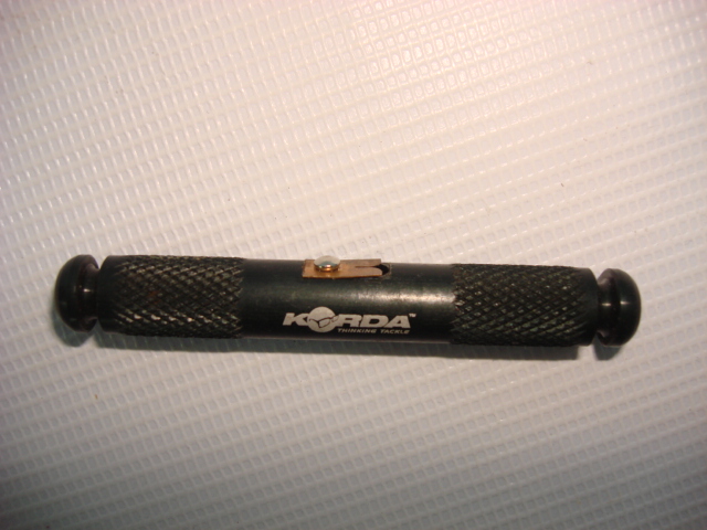 Dispozitiv pentru decojit camasa firului textil marca Korda= 20lei